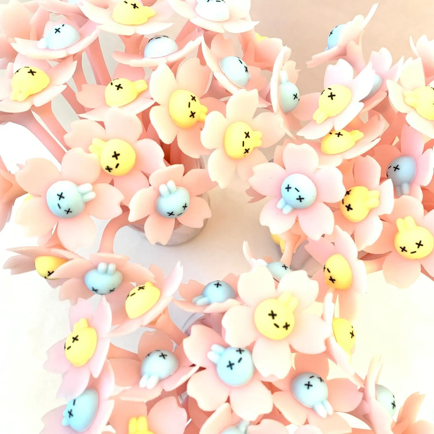 X 22419 SAKURA RABBIT FLOWER WIGGLE GEL PEN-DISCONTINUED