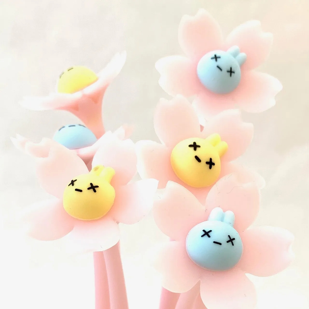X 22419 SAKURA RABBIT FLOWER WIGGLE GEL PEN-DISCONTINUED